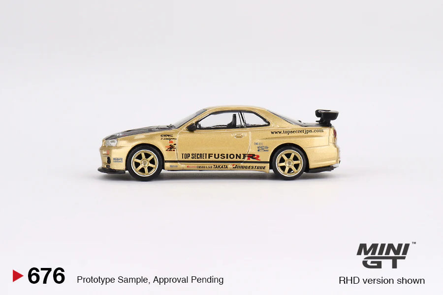NISSAN SKYLINE GT-R R34 TOP SECRET (GOLD) JAPAN LIMITED -- MINI GT 1:64