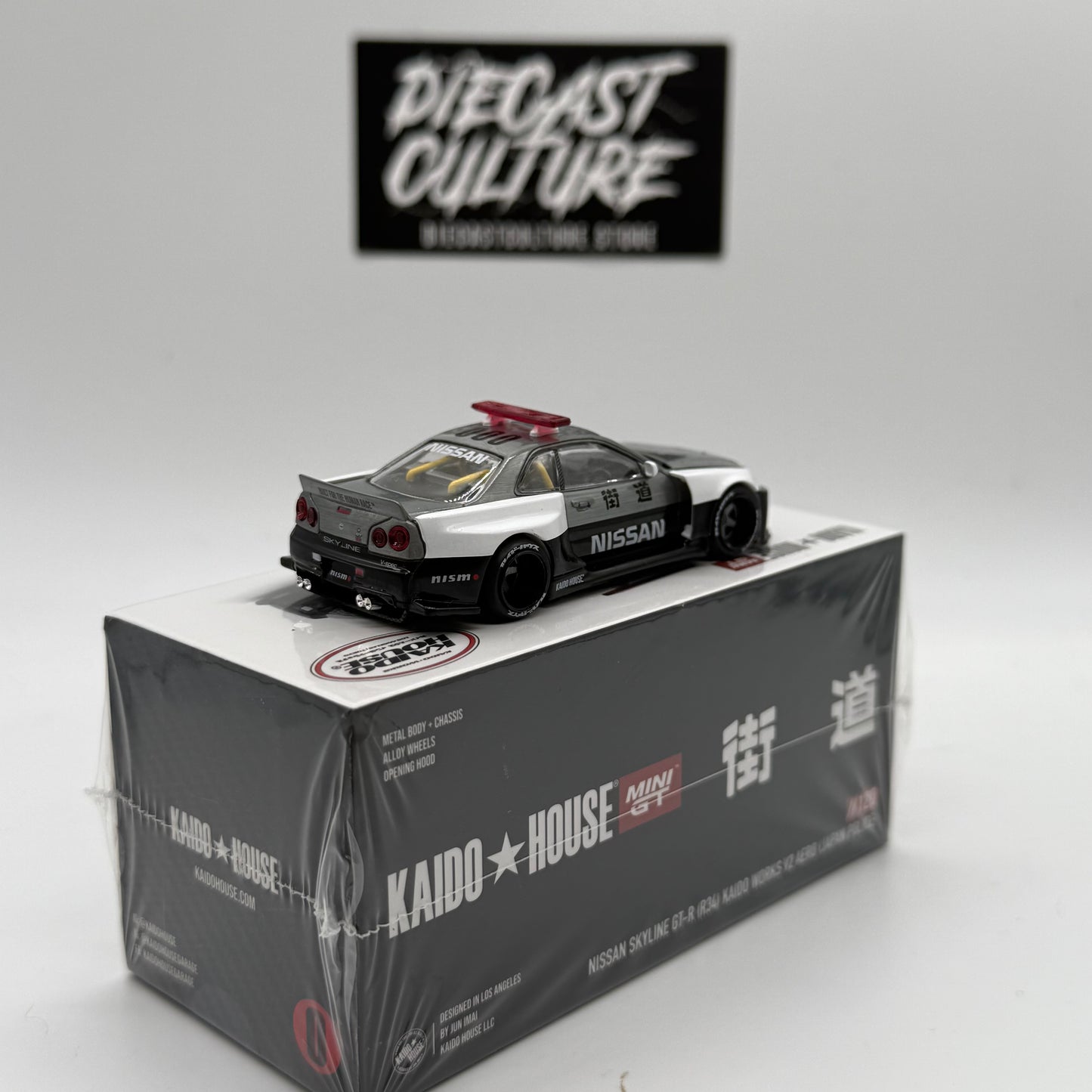 Nissan Skyline GT-R (R34) Kaido Works V2 AERO (JAPAN POLICE) *CHASE* Kaido House x MiniGT