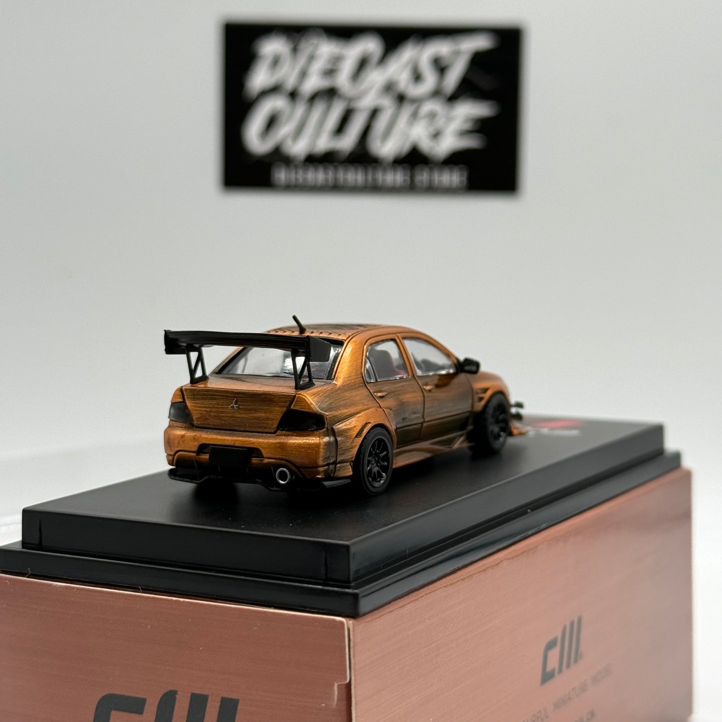 Mitsubishi Lancer Evolution X Faded Gold- CM Model 1:64