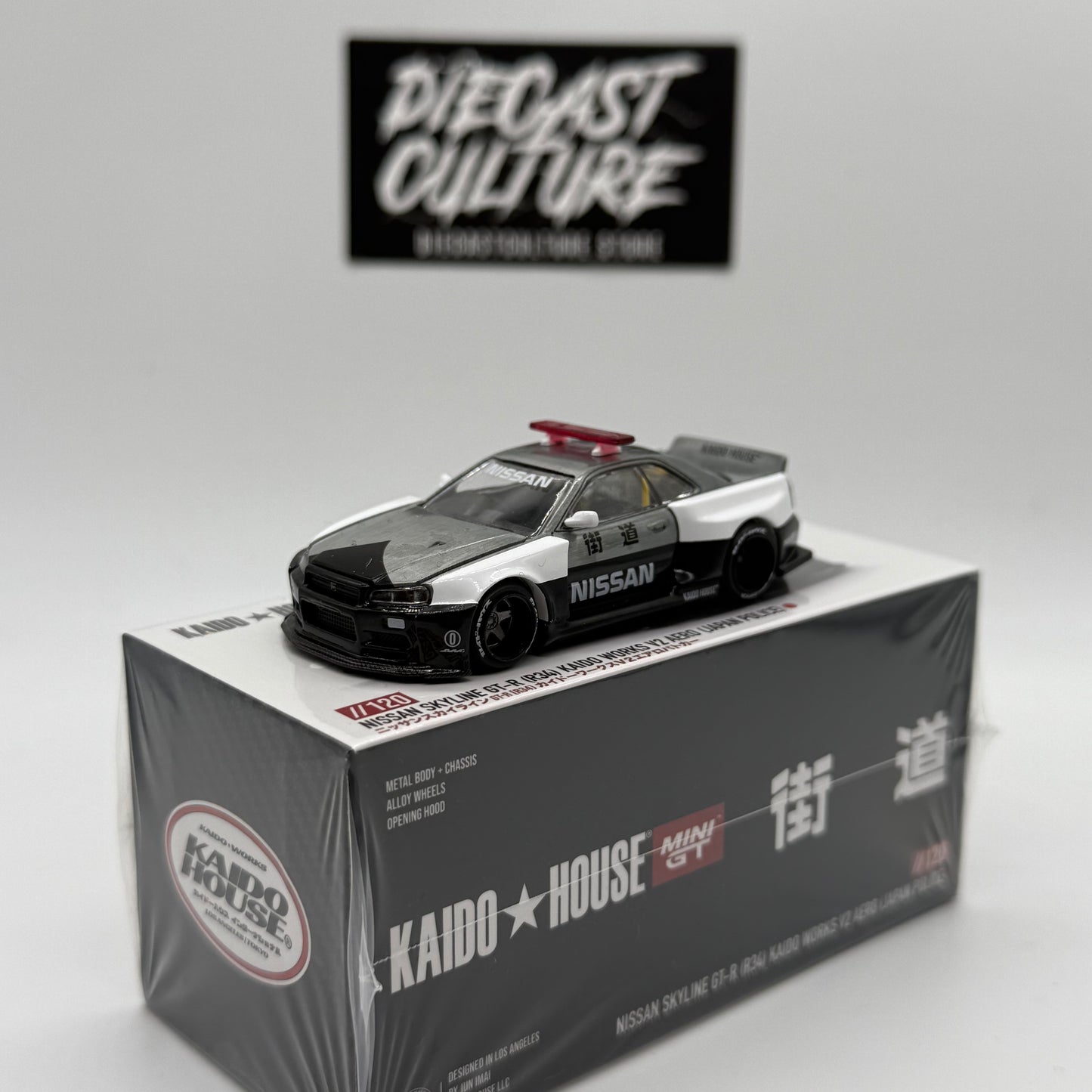 Nissan Skyline GT-R (R34) Kaido Works V2 AERO (JAPAN POLICE) *CHASE* Kaido House x MiniGT