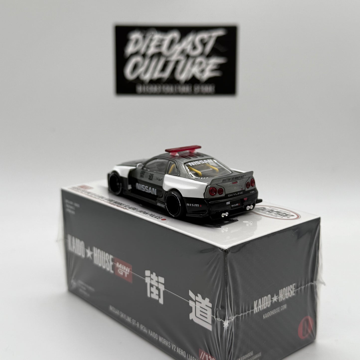 Nissan Skyline GT-R (R34) Kaido Works V2 AERO (JAPAN POLICE) *CHASE* Kaido House x MiniGT