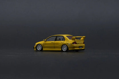 MITSUBISHI LANCER EVO VII (7)(YELLOW) BM CREATIONS 1:64