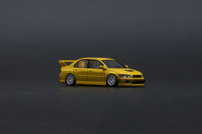 MITSUBISHI LANCER EVO VII (7)(YELLOW) BM CREATIONS 1:64