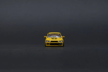 MITSUBISHI LANCER EVO VII (7)(YELLOW) BM CREATIONS 1:64